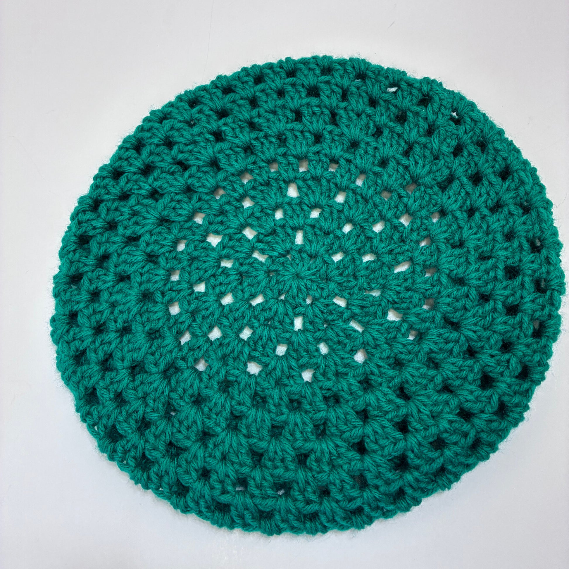 Green crocheted beret