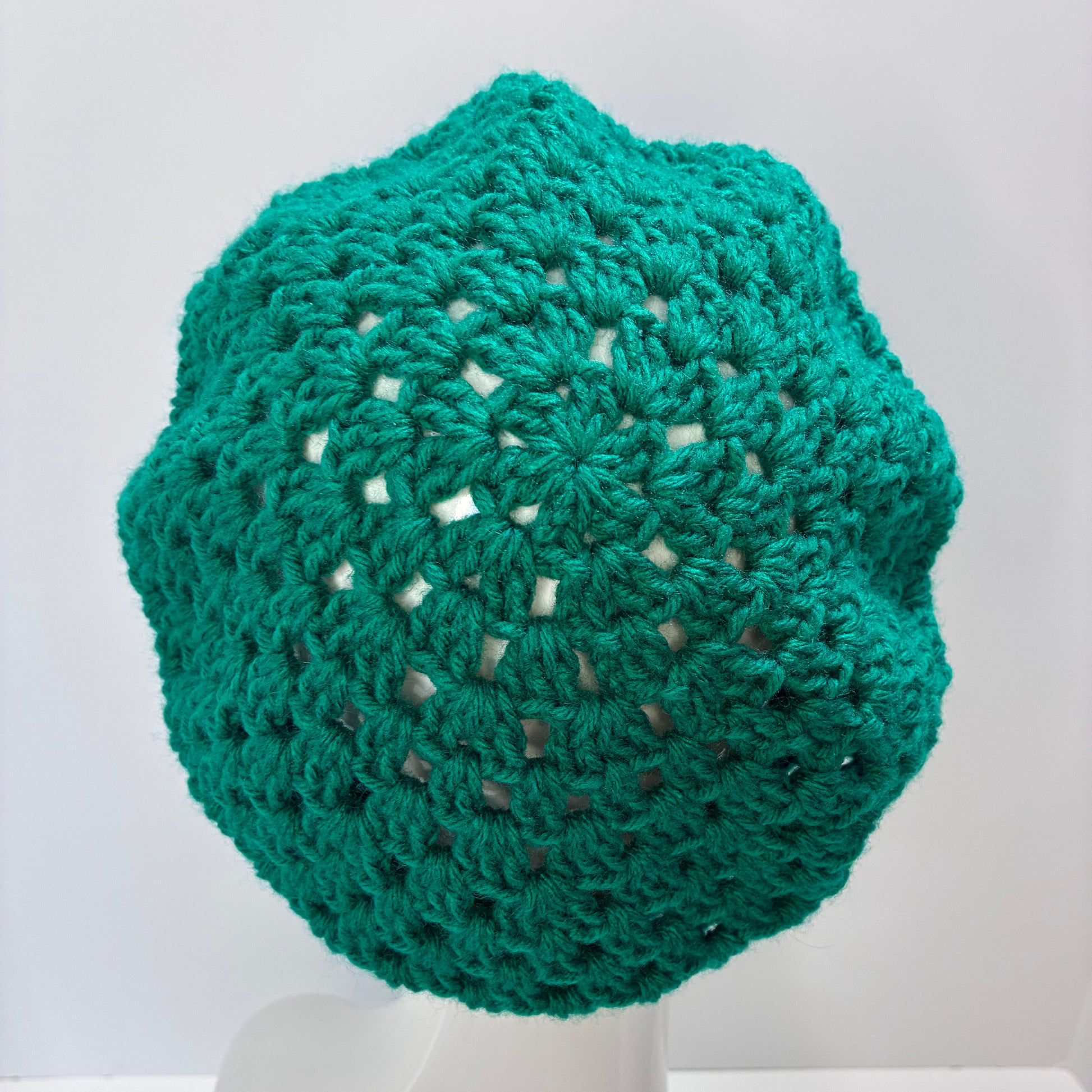 Green crocheted beret