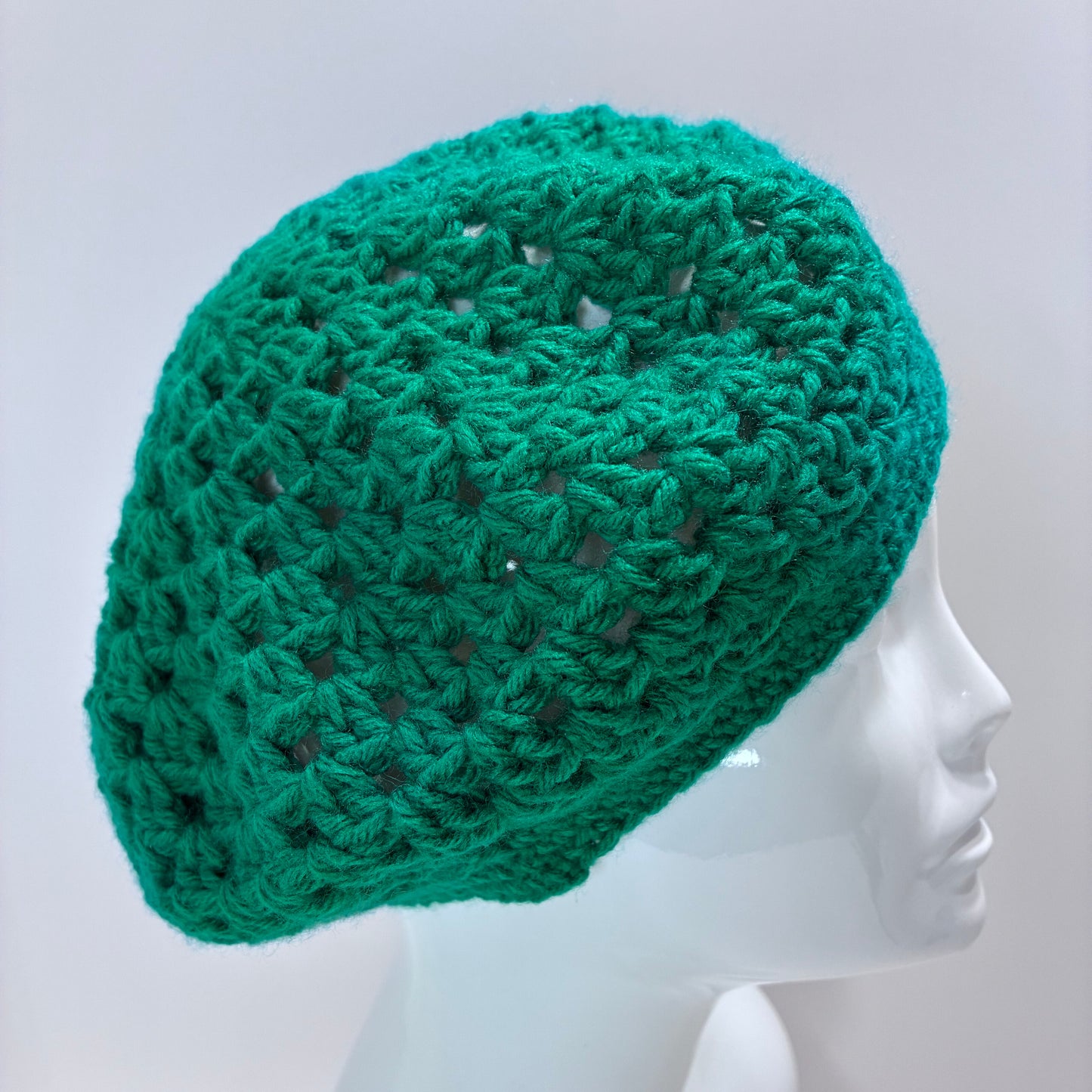 Green crocheted beret