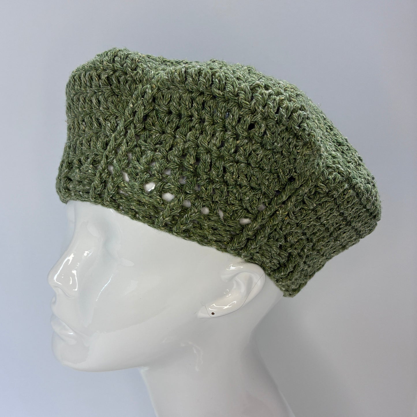 Green crocheted beret
