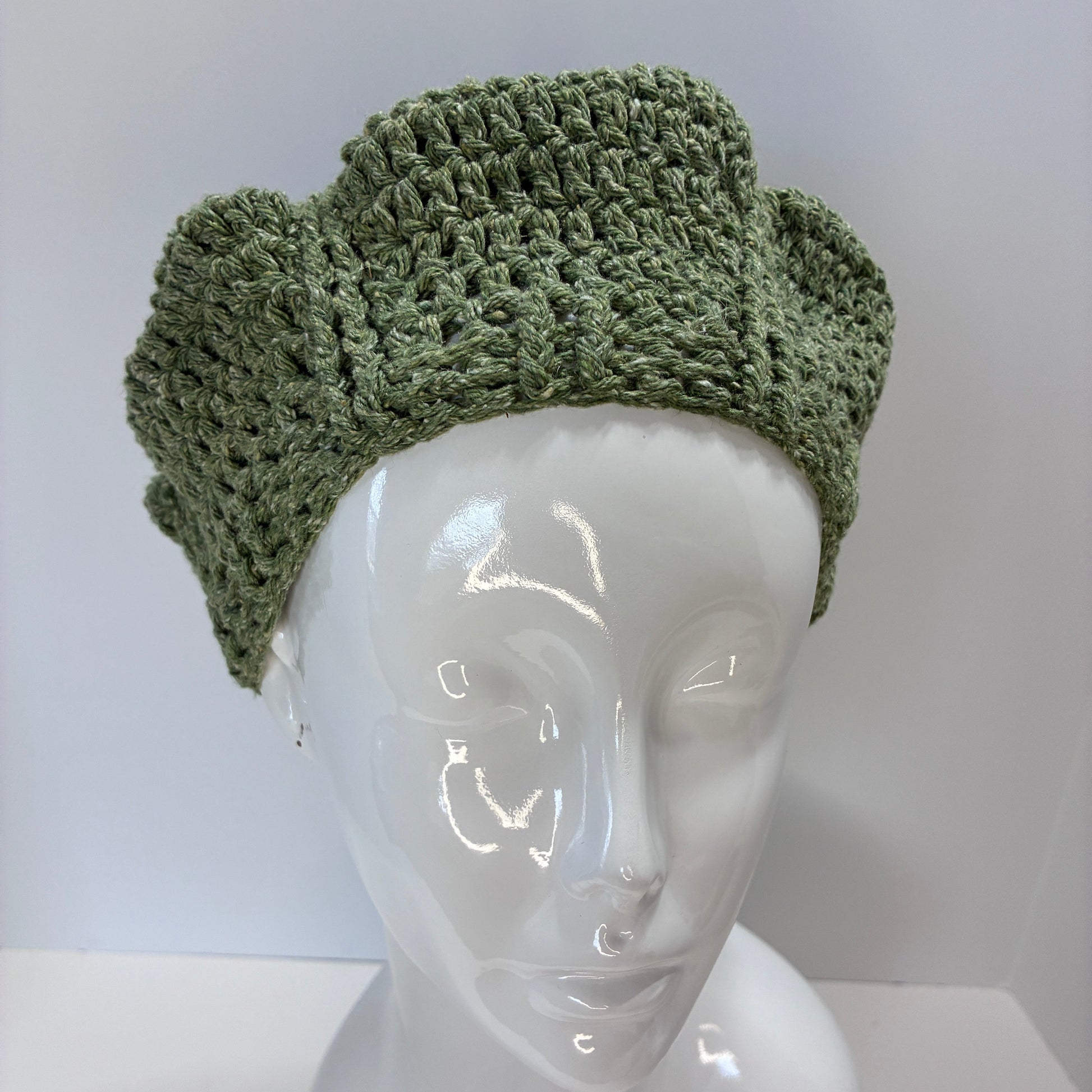 Green crocheted beret